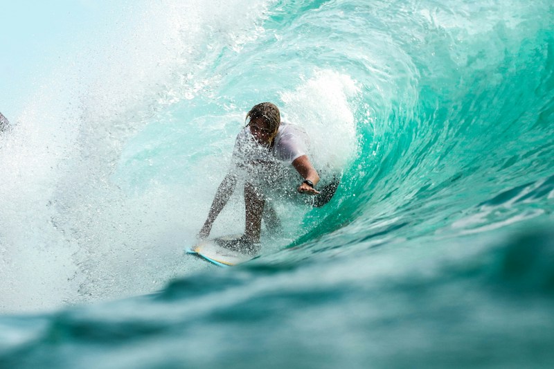 A surfer making the most of the ocean